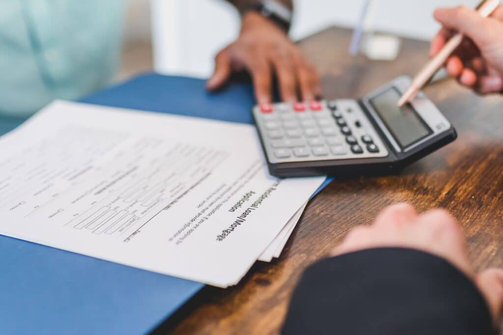 Couple reviewing finances before buying a home.